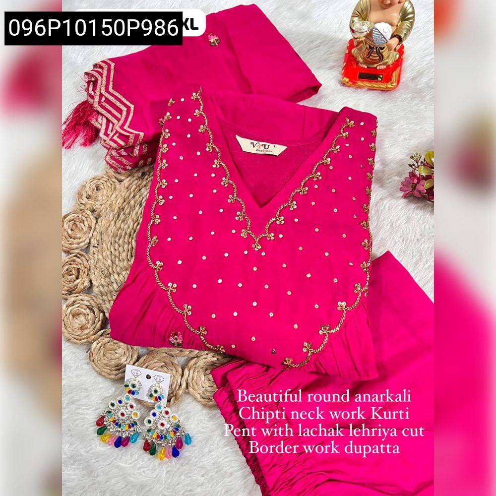 Fuchsia Round Anarkali Kurti Set with heavy embellishments and matching pant and dupatta, flat lay