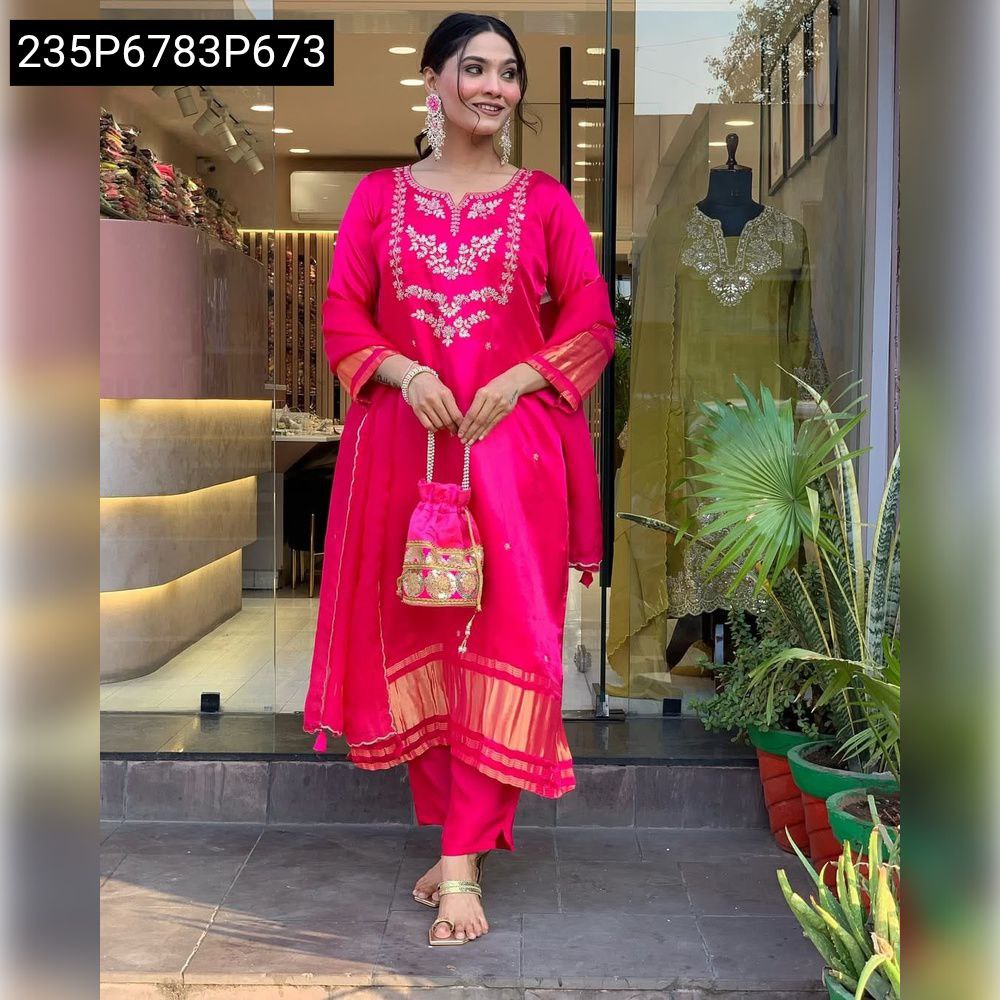 Woman in fuchsia sequence embroidered kurta pant dupatta set, smiling