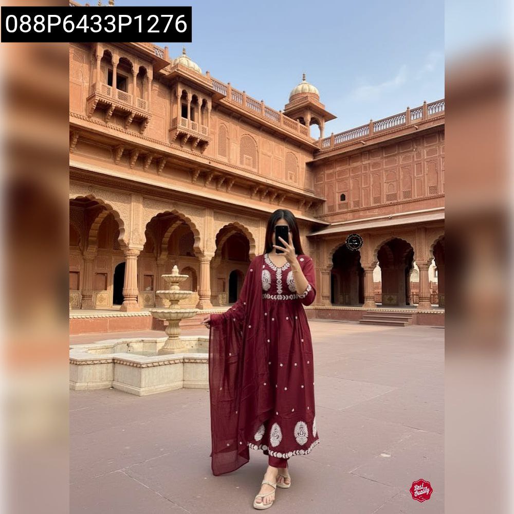 Women's Maroon Anarkali Kurta Set with Hand Work, full length model shot in traditional setting.