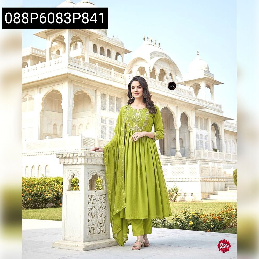 Model in lime green Anarkali kurti set, full body shot, against a white palace backdrop.