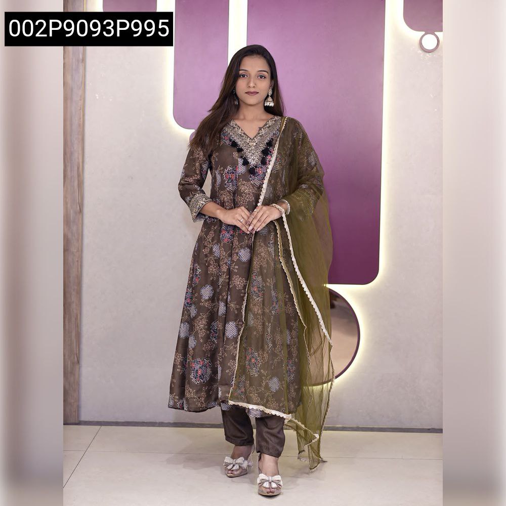 Full body front view of model in brown floral printed Anarkali style kurti set with net dupatta.