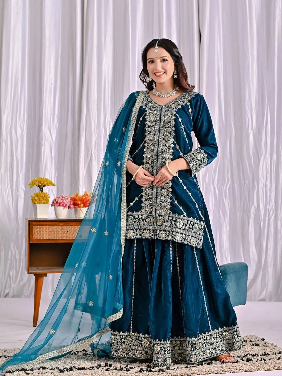 Elegant Woman in Peacock Blue Velvet Sharara Suit, Designer Party Wear Look