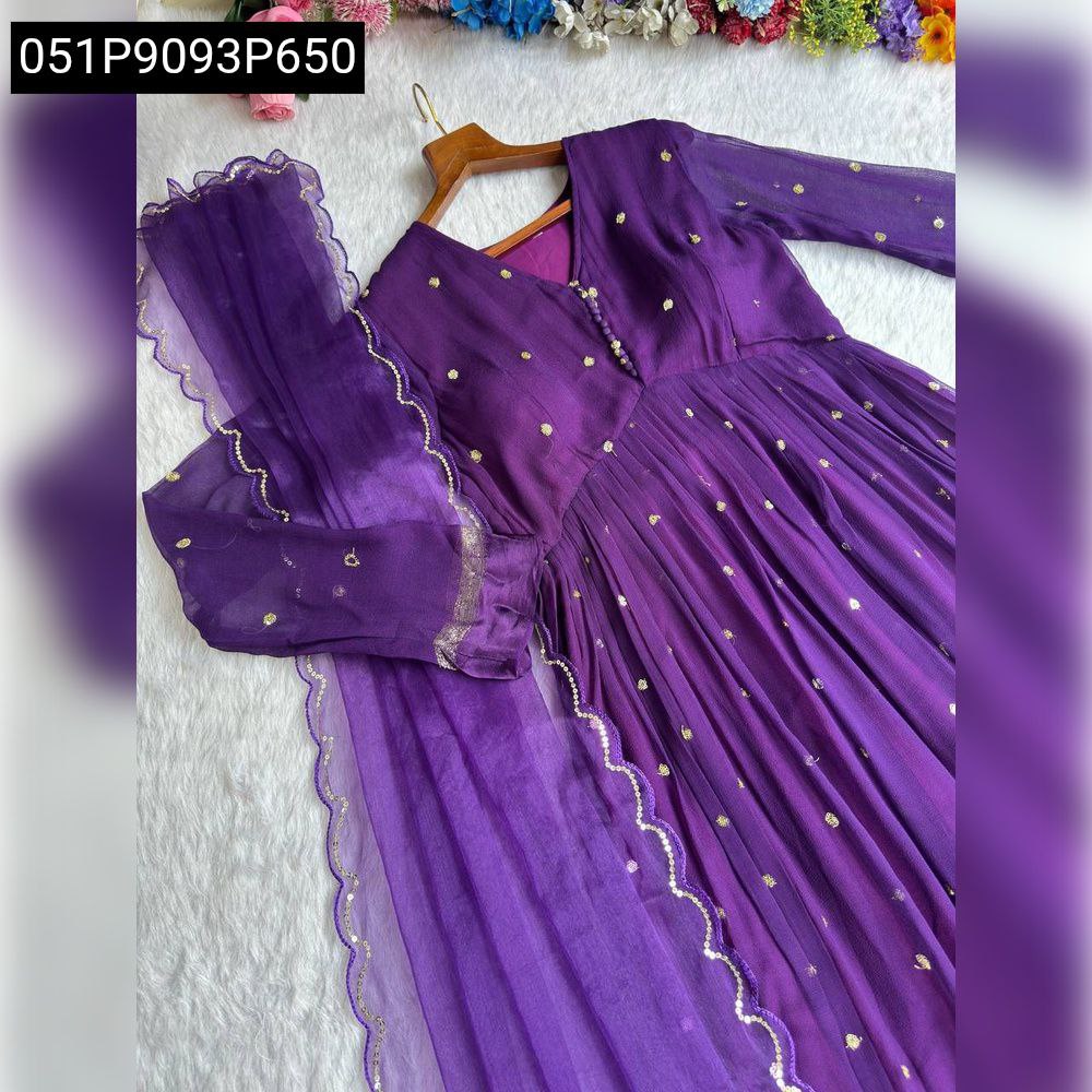 Close-up view of the purple Viscous Georgette Anarkali gown with golden sequence work, hanging gracefully.