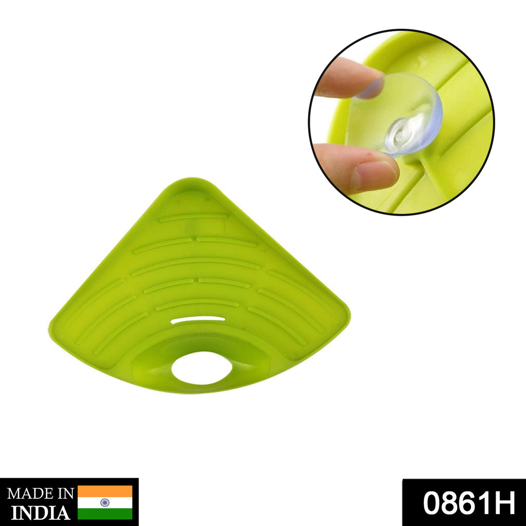 Corner sink strainer in use, efficiently draining kitchen waste from food scraps in a kitchen sink.