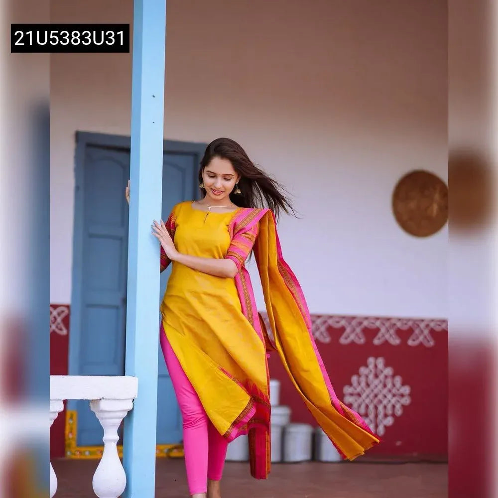 Model wearing TRENDBUY Yellow Silk Cotton Kurti Set with pink leggings and Dupatta - Festive Wear