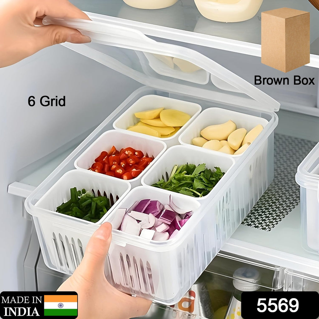 Clear fridge storage box set with draining crisper, full of fresh vegetables and fruits
